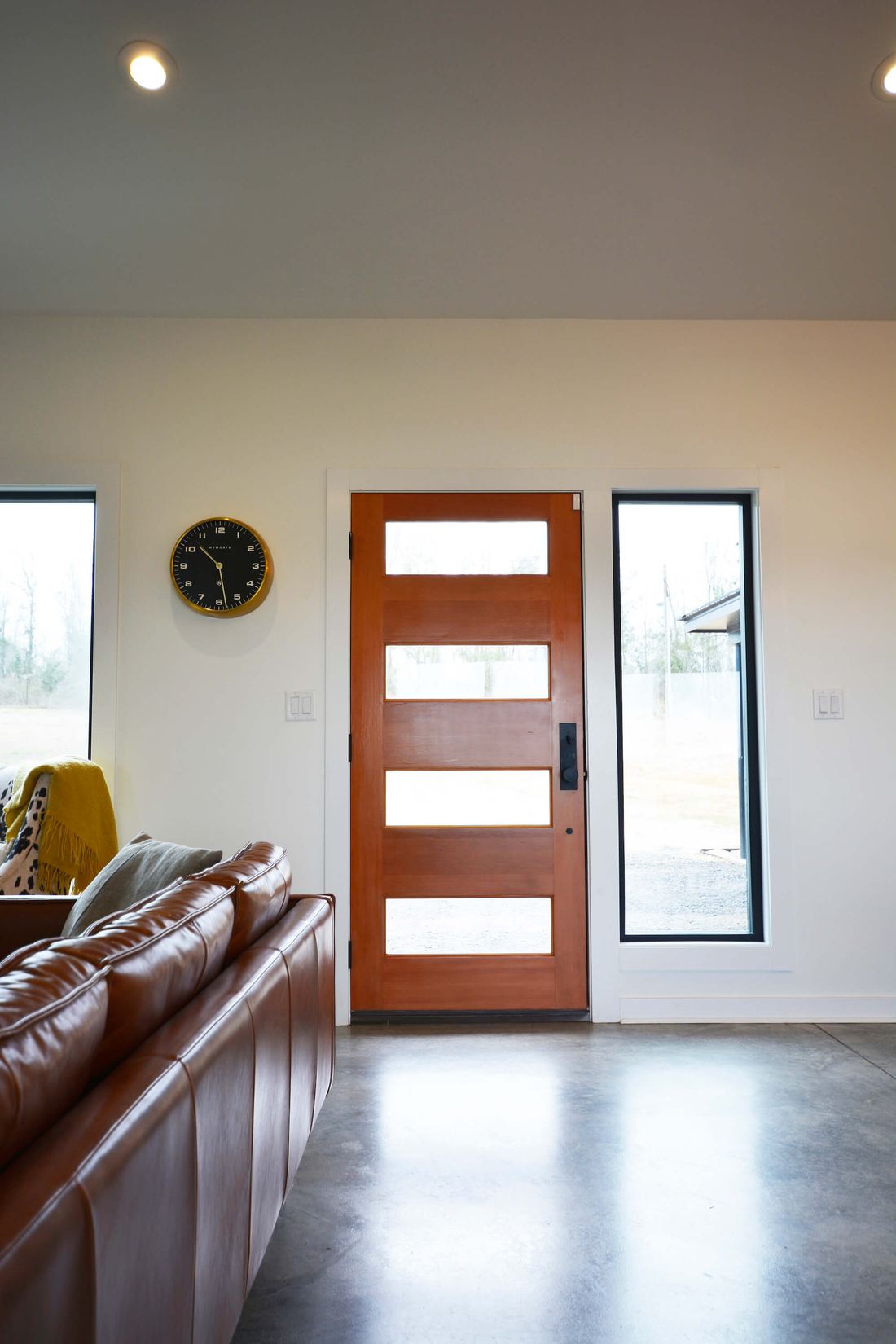 Modern Farmhouse entry with wood door
